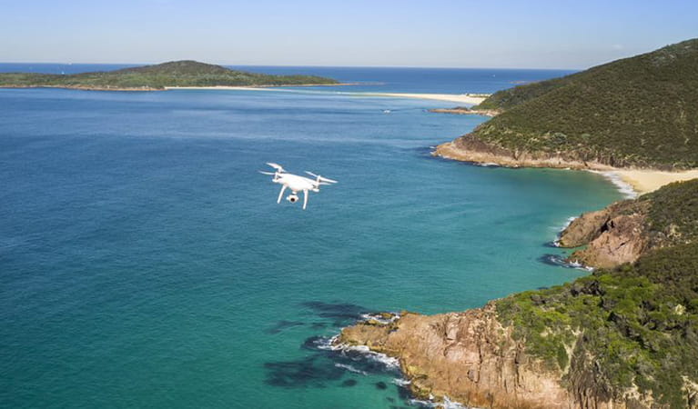 Photo of a drone flying above a national park. Photo: John Spencer/DPIE